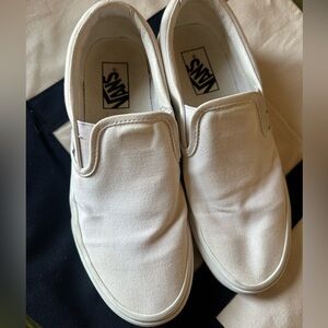 White slip on Vans